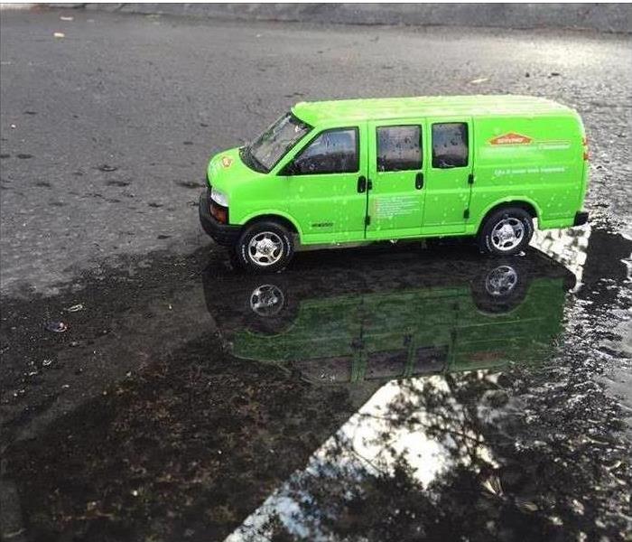 SERVPRO vehicle on rainy asphault